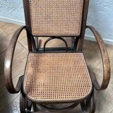 Curved wooden rocking chair