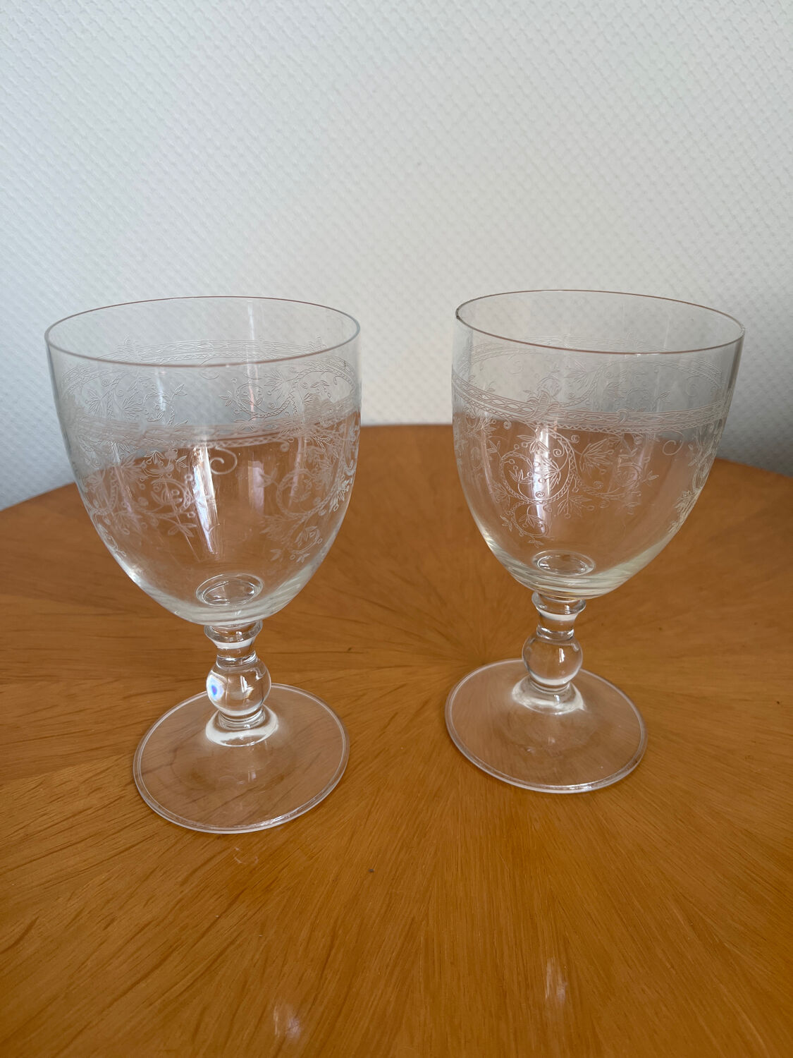 Set of two engraved glass wine glasses