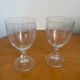 Set of two engraved glass wine glasses