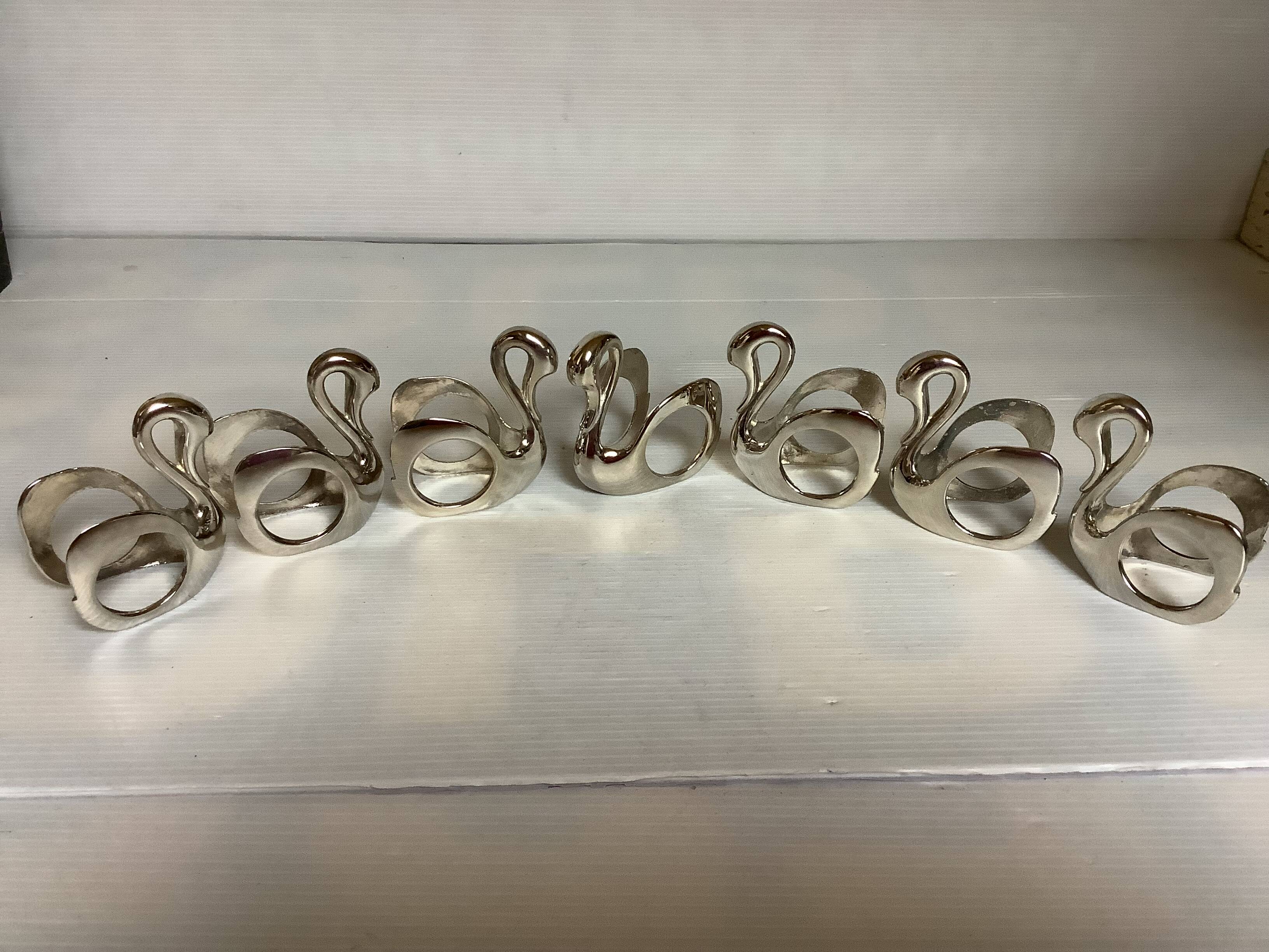 Seven silver-plated zoomorphic metal knife rests