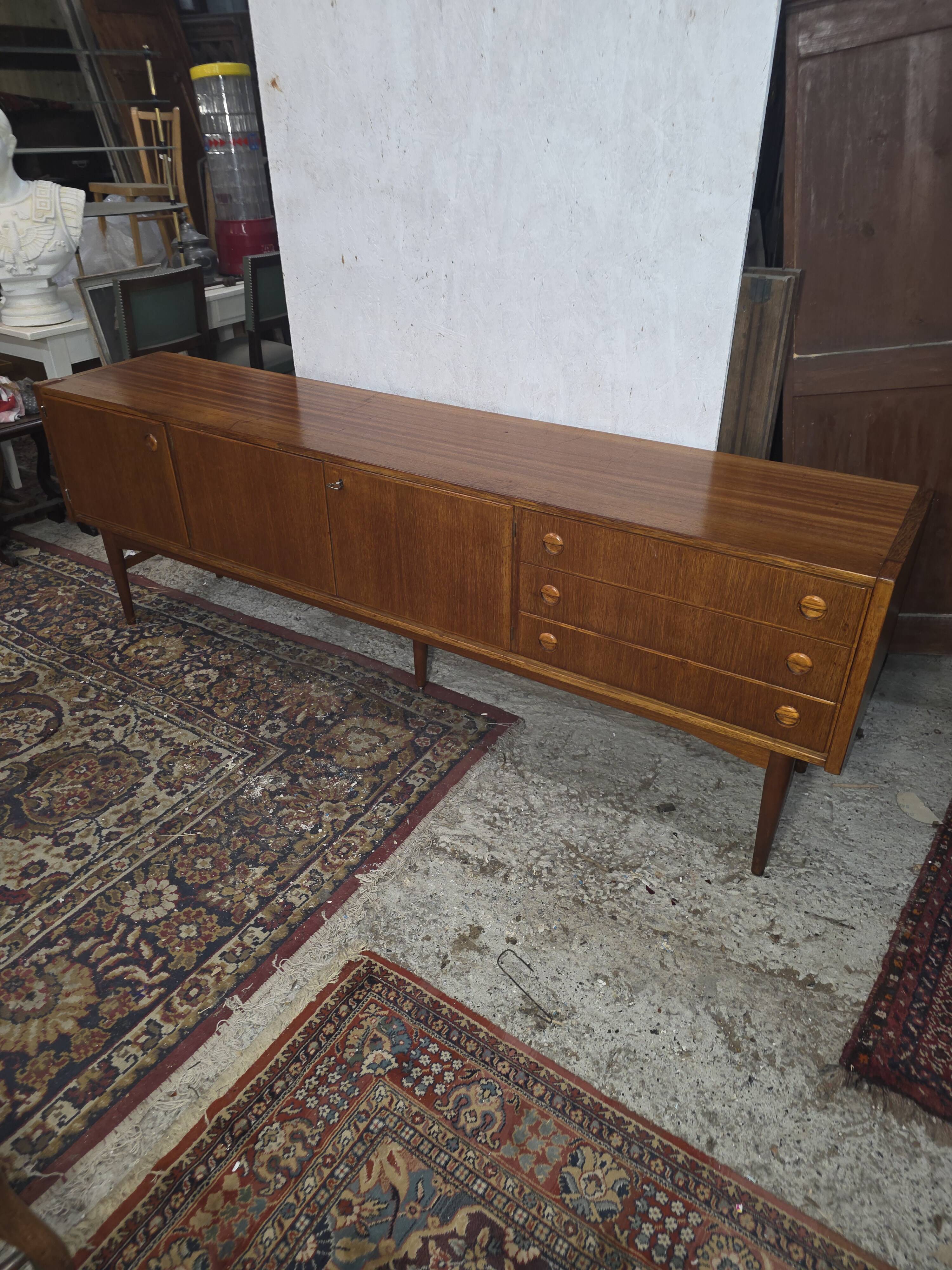 Scandinavian teak enfilade from the 1960s / 222cm in length.