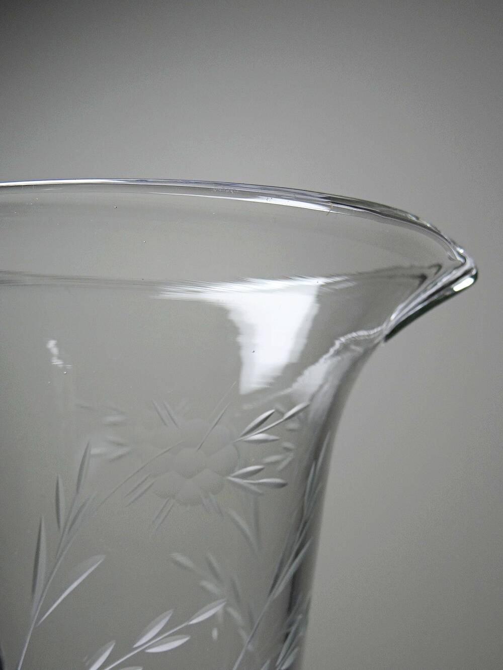 Antique glass pitcher with wheel engraving and floral decoration, Bohemia, early 20th century.