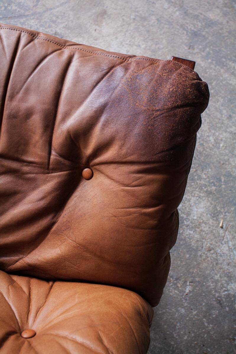 Siesta armchair by Ingmar Relling with ottoman — bentwood dark brown frame, cognac leather