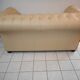 Beige leather chesterfield sofa