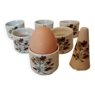 Vintage egg cups and salt shakers