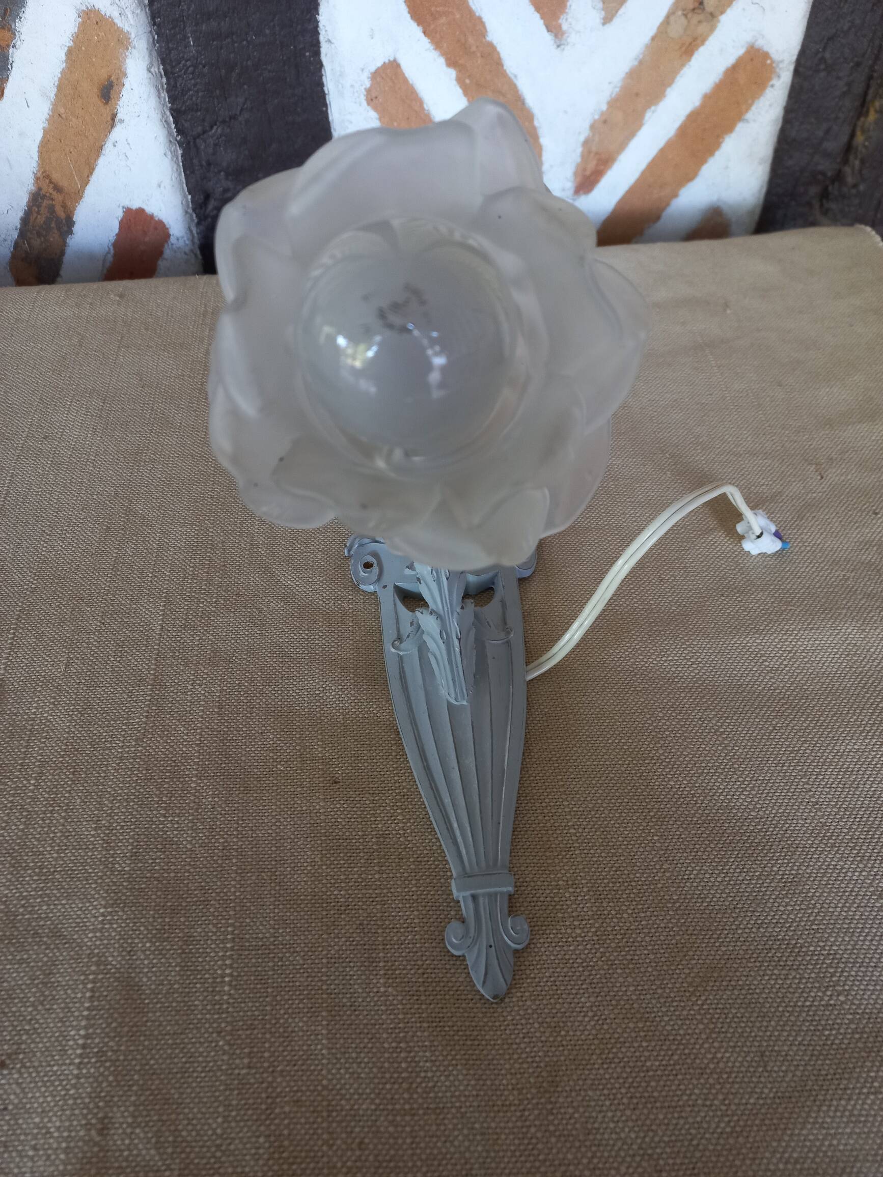 Art deco swan neck wall light with pink shade
