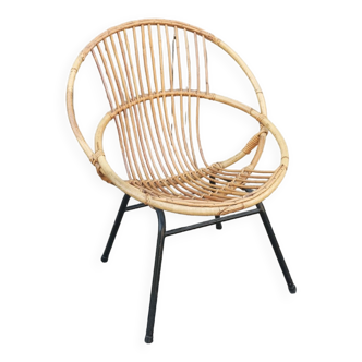 Vintage rattan armchair and metal foot