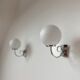 Pair of chrome and opaline metal wall lamps