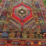 Old Moroccan carpet, made of natural wool and handwoven.