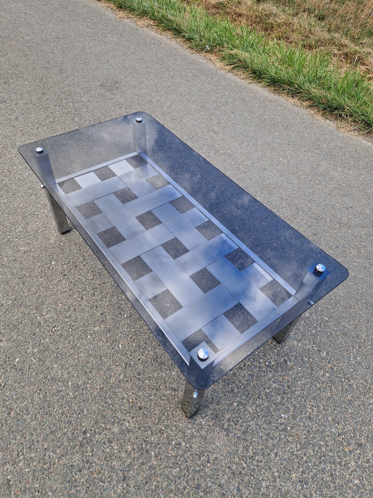Stainless steel and smoked glass coffee table
