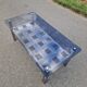 Stainless steel and smoked glass coffee table