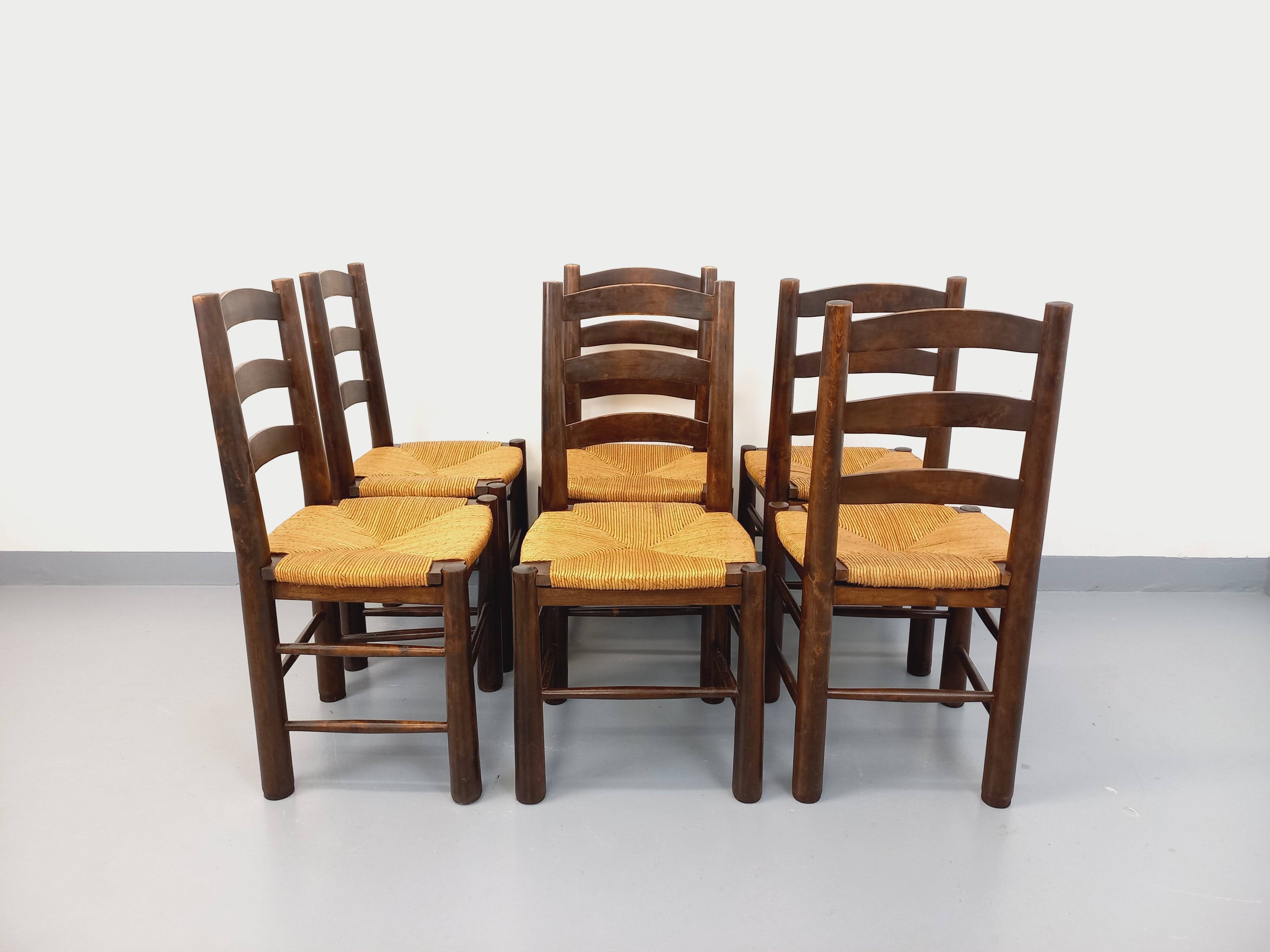 Set of 6 vintage brutalist chairs by Georges Robert in straw wood from the 1960s.