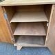 Vintage 1950s oak enfilade buffet with tapered legs.