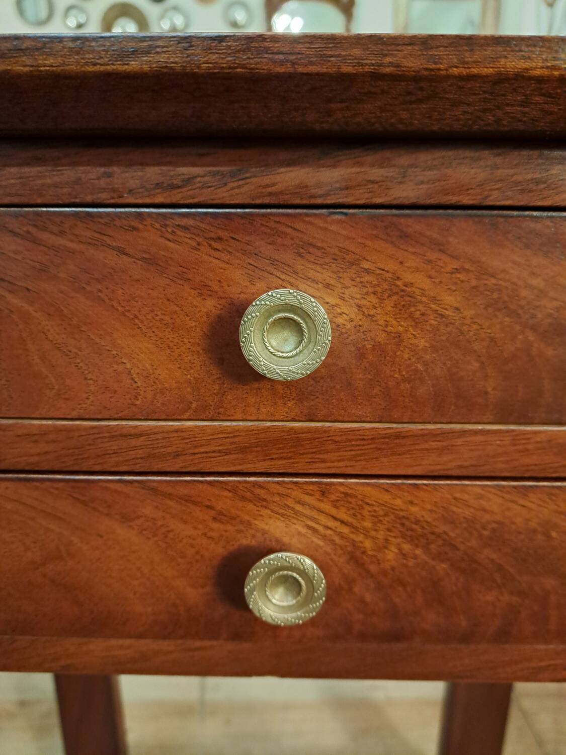 Empire style bedside table in mahogany and bronze