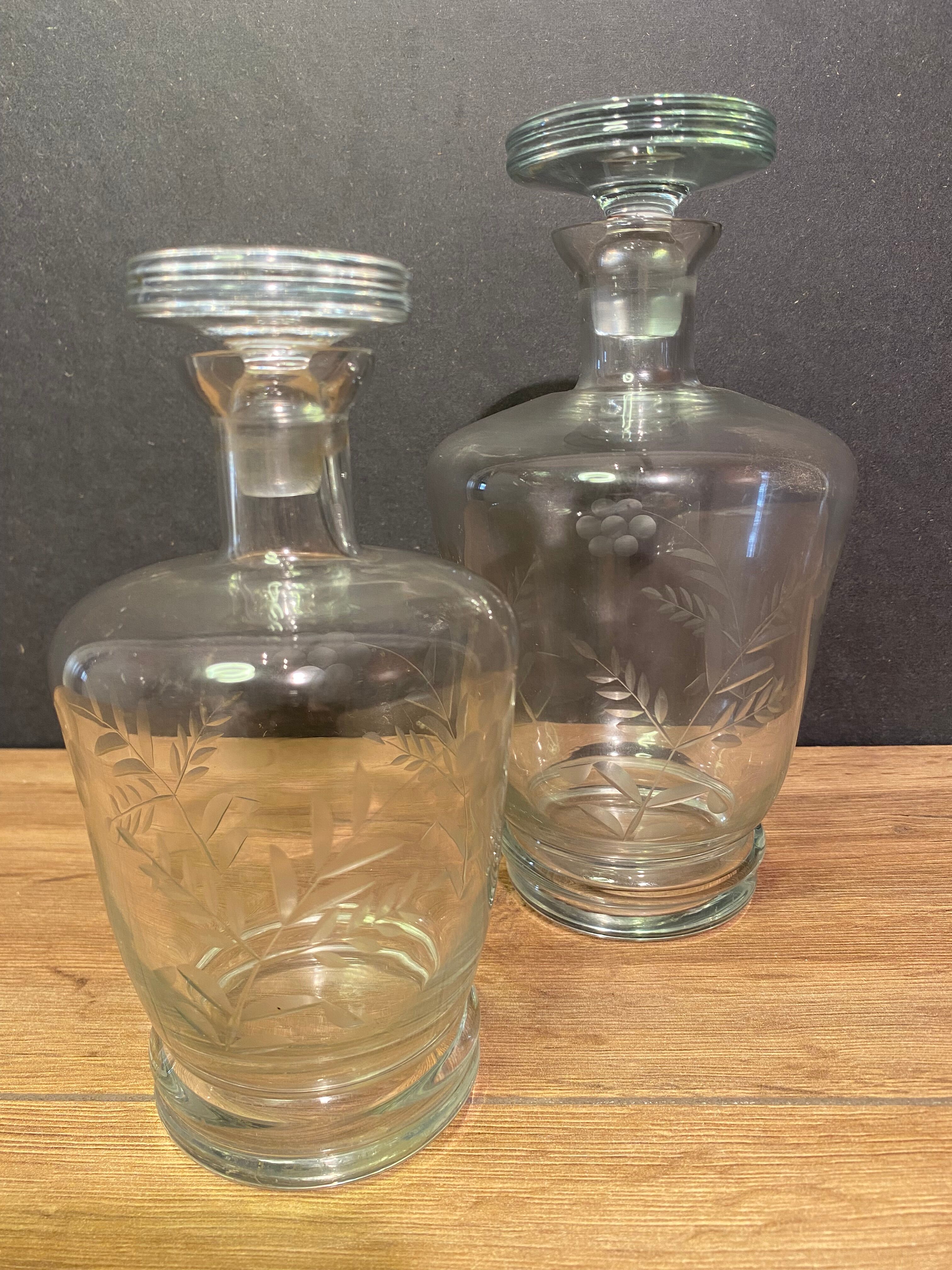 Two carafes in cut glass with vegetal decoration, vintage design