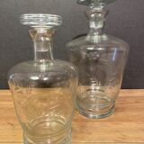 Two carafes in cut glass with vegetal decoration, vintage design