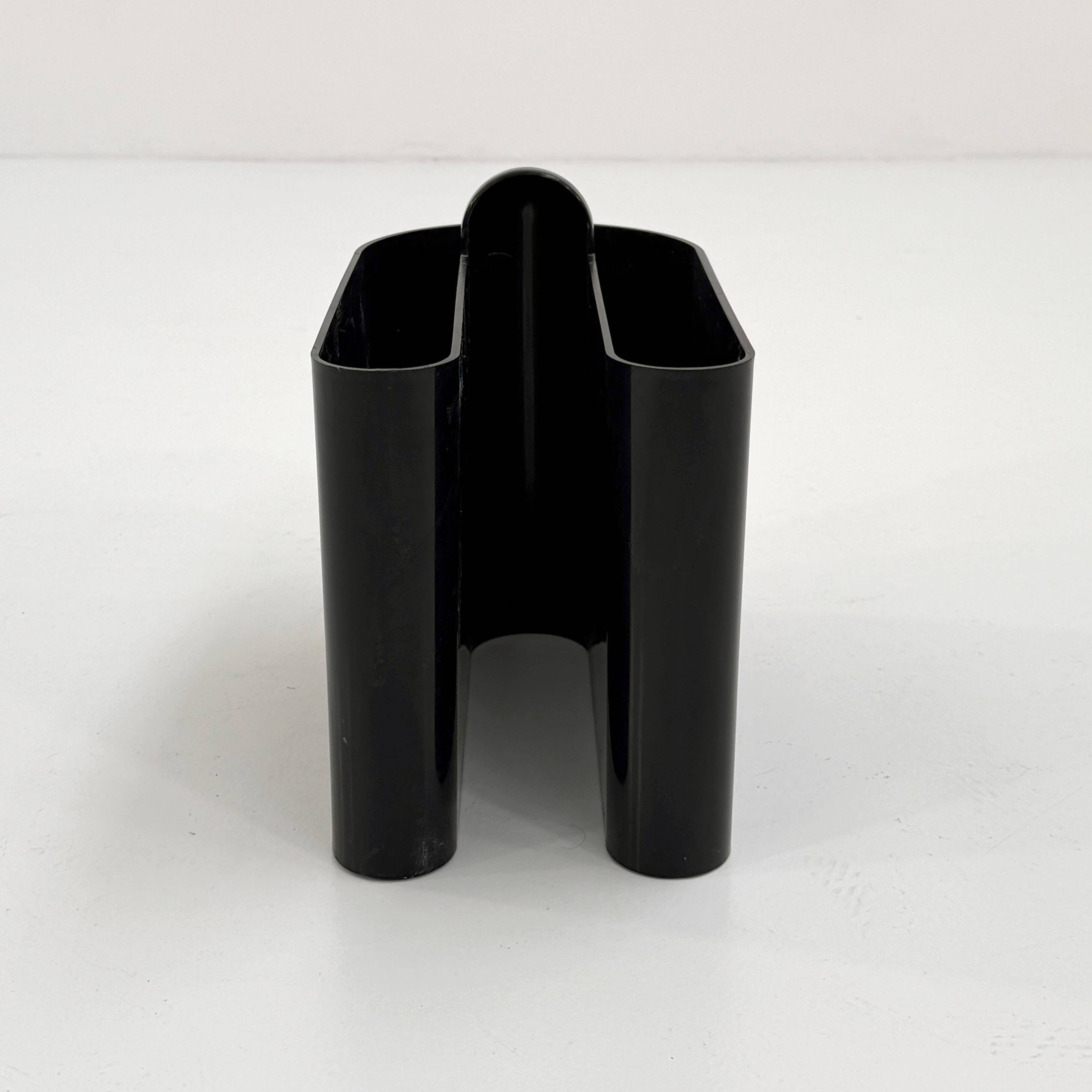 Black magazine rack by Rodolfo Bonetto for Bilumen, 1970