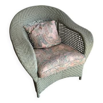 Fauteuil lounge vintage en osier avec coussins pastel – années 1980