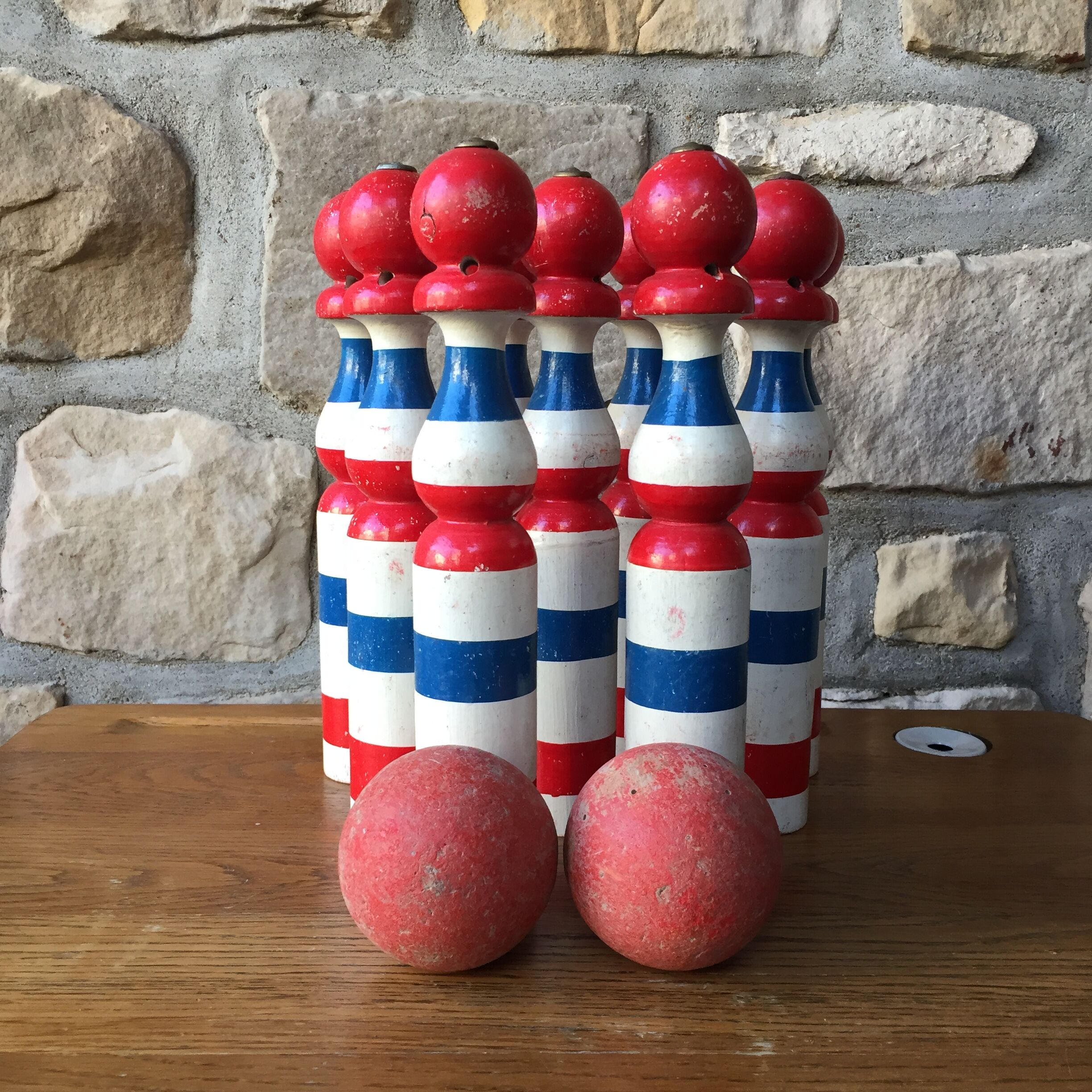 Old vintage wooden bowling game triclore plus two balls