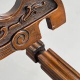 Vintage carved wooden folding armchair