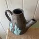 Enamelled terracotta teapot signed Keka