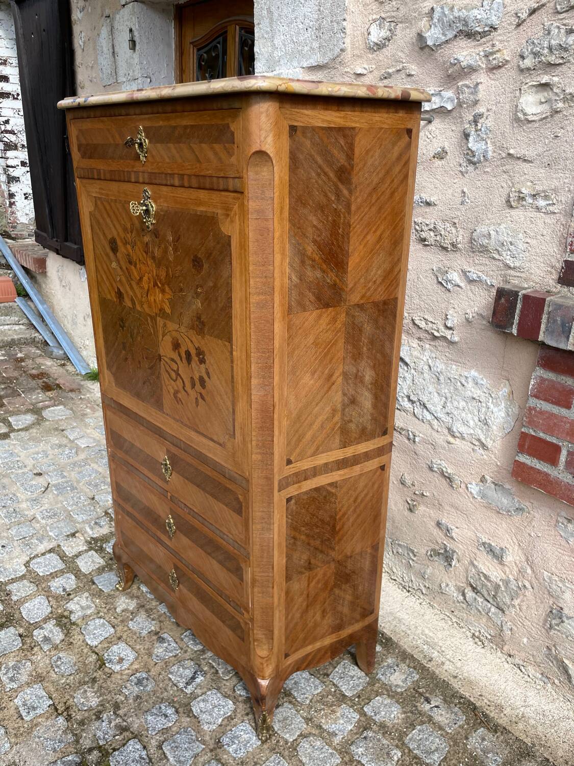 Old wooden and marble secretary