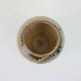 Small beige glazed ceramic vase with abstract relief pattern