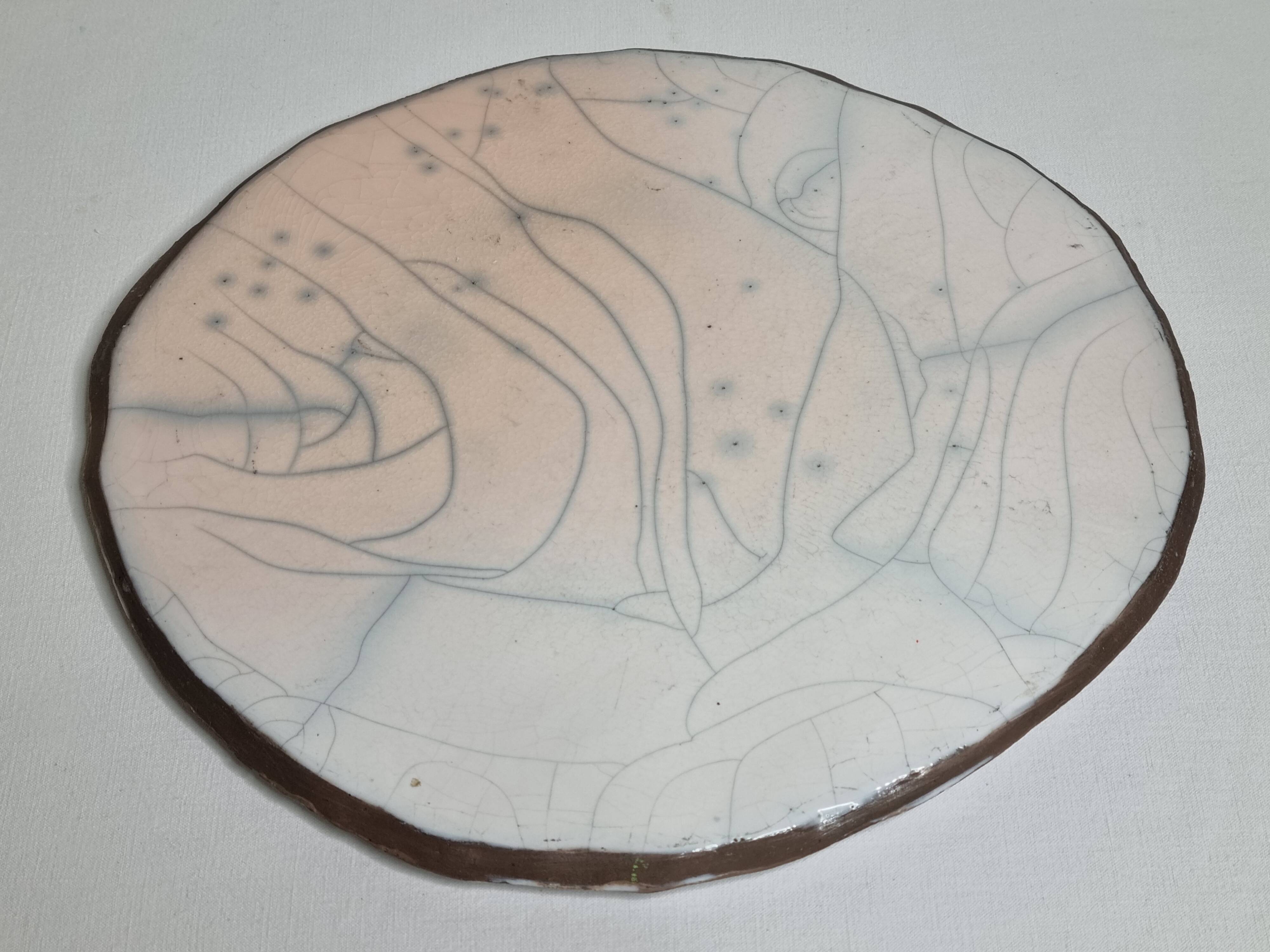 Raku ceramic presentation dish with abstract decoration, 31 cm