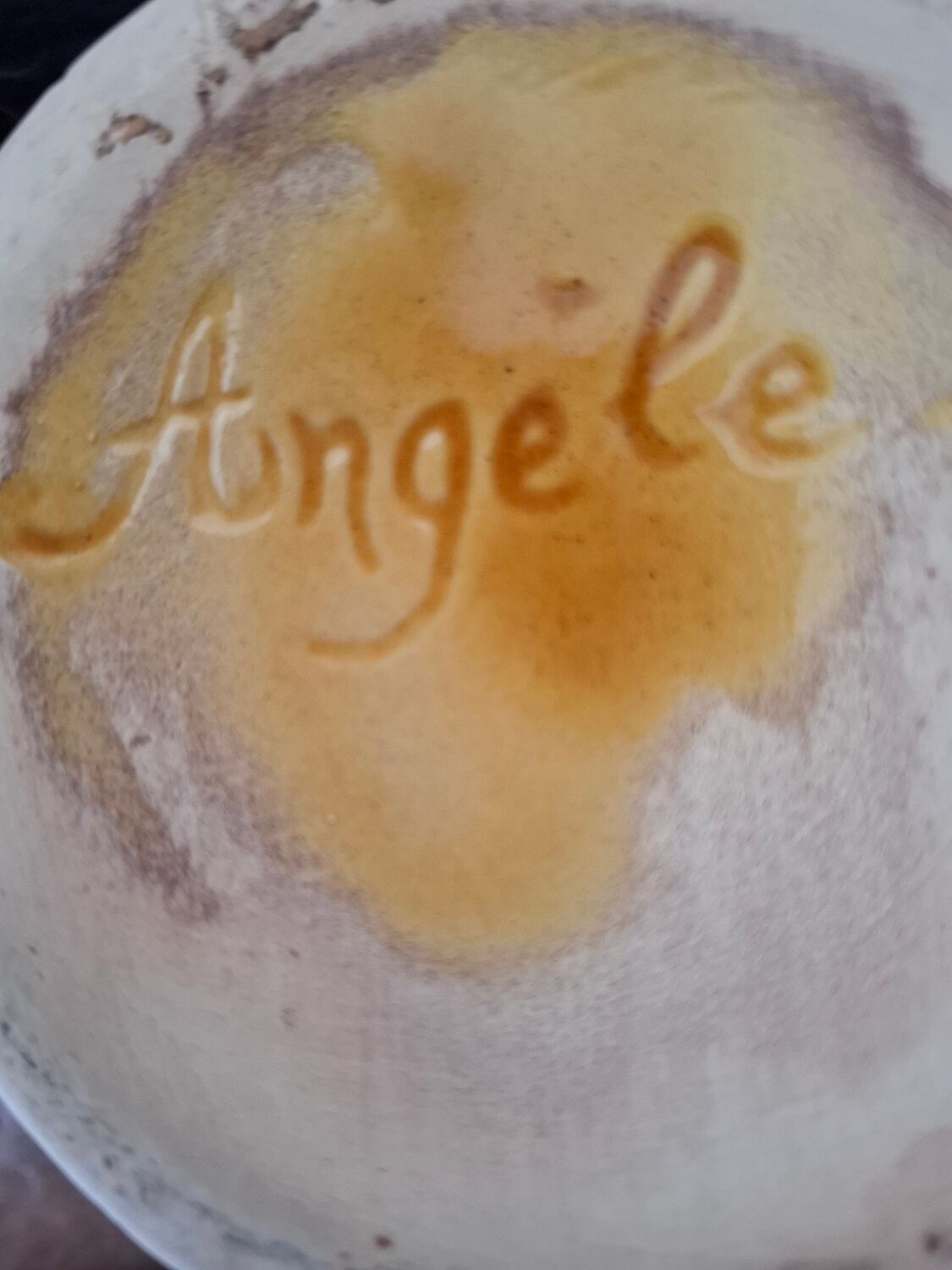 Ceramic jug signed Angèle