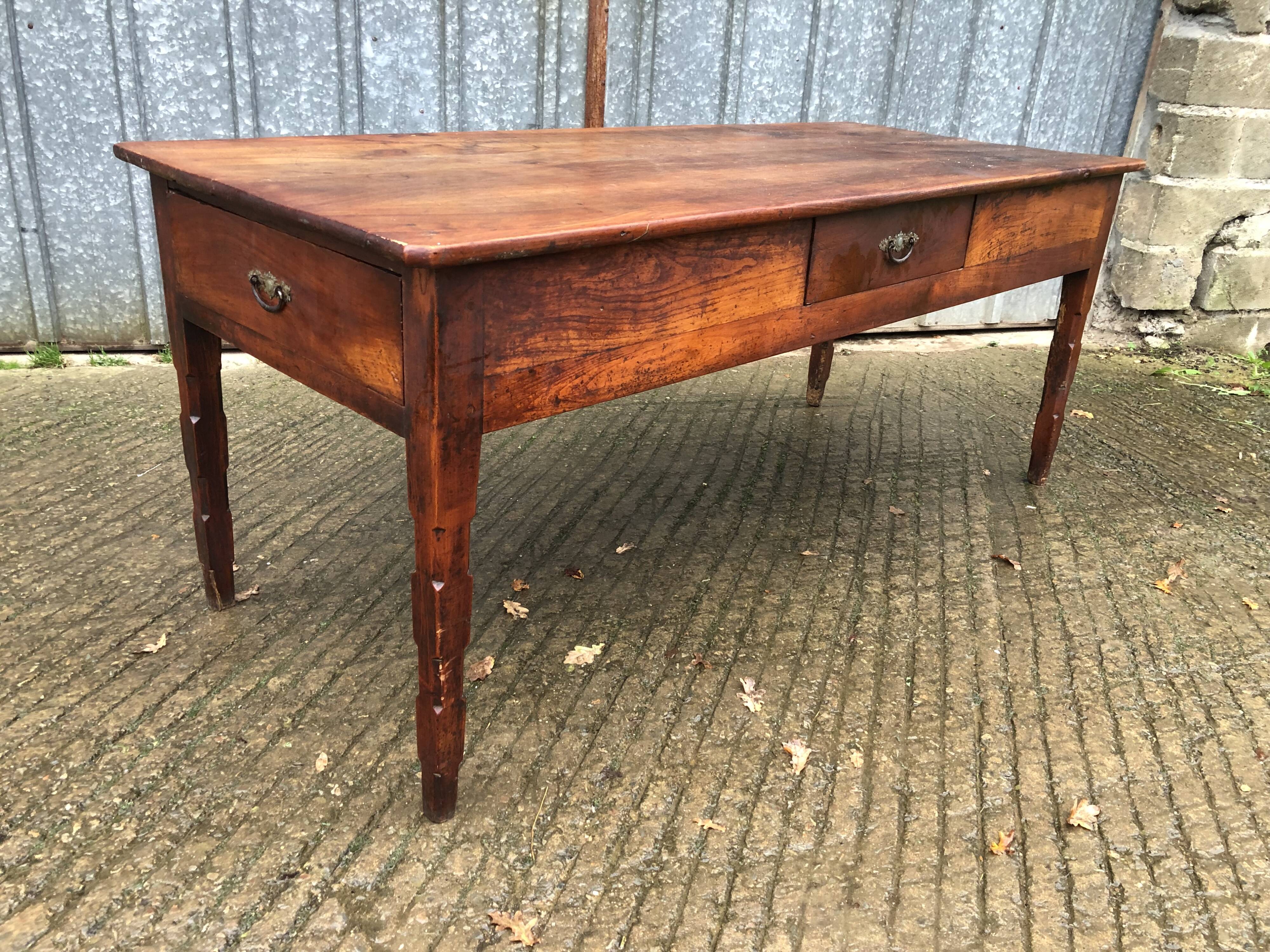 Antique farmhouse table in solid cherry wood with 3 drawers.