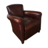 Club chair in brown leather