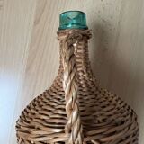 Dame jean covered in woven wicker
