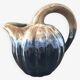 Ceramic melon jug signed