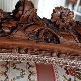 Pair of carved bergere armchairs