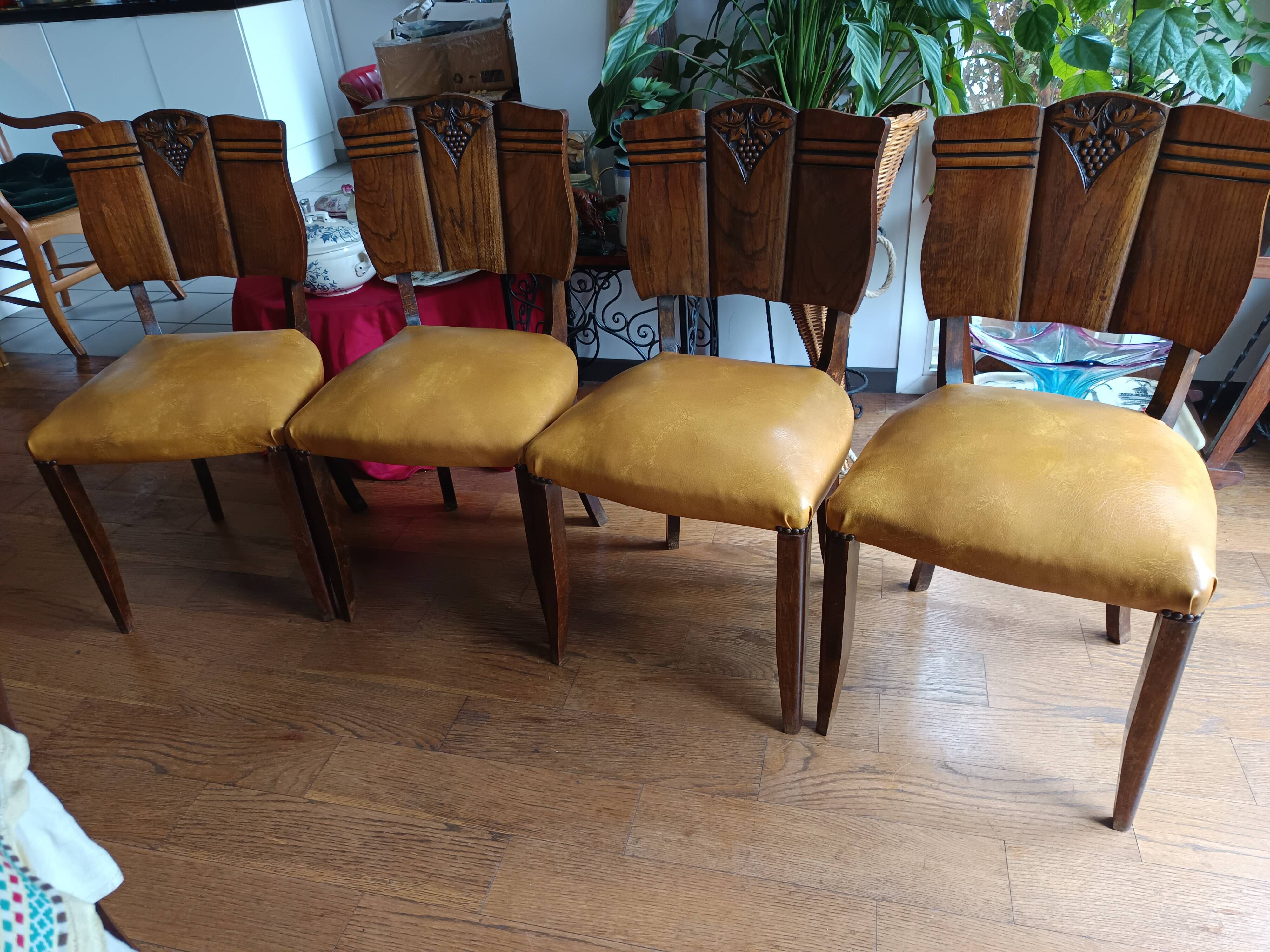 set of 4 vintage Art Deco chairs with carved wood and grape cluster design
