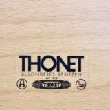 Thonet curved dining chairs stacked in chrome and beech