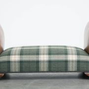 Antique daybed reupholstered with sheepskin and Scottish tartan wool