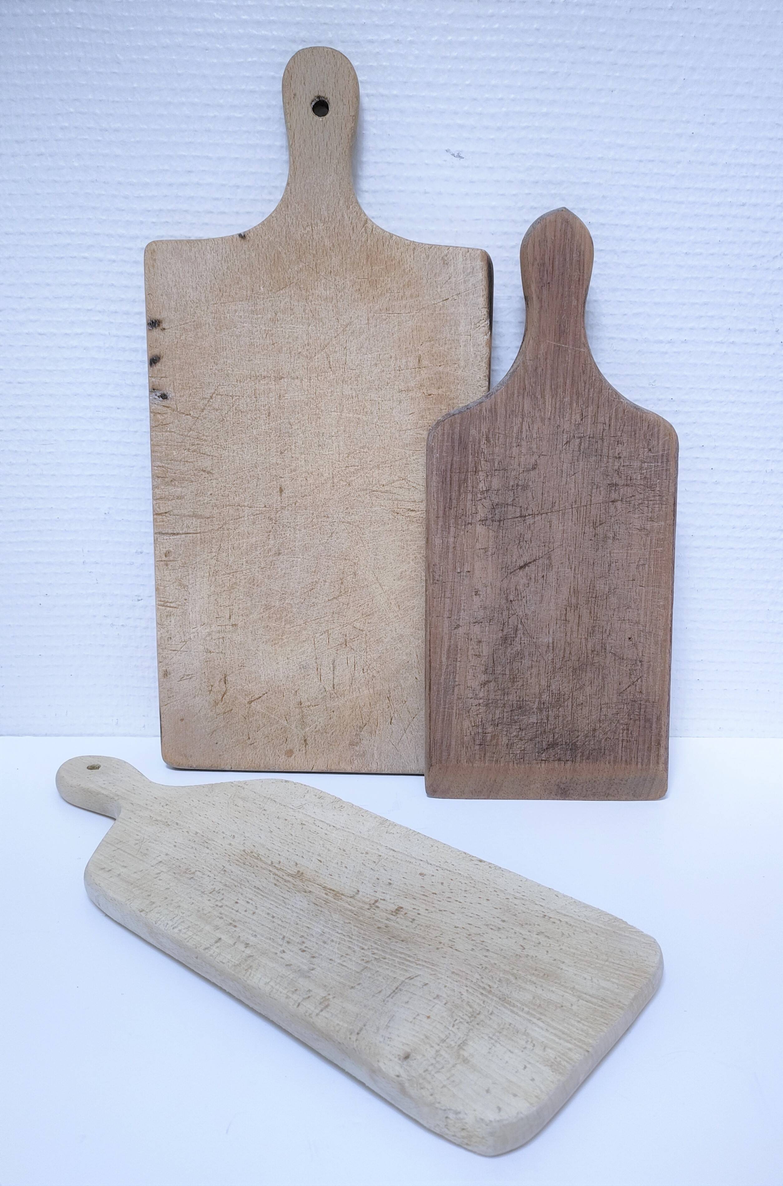 Three vintage solid wood cutting boards