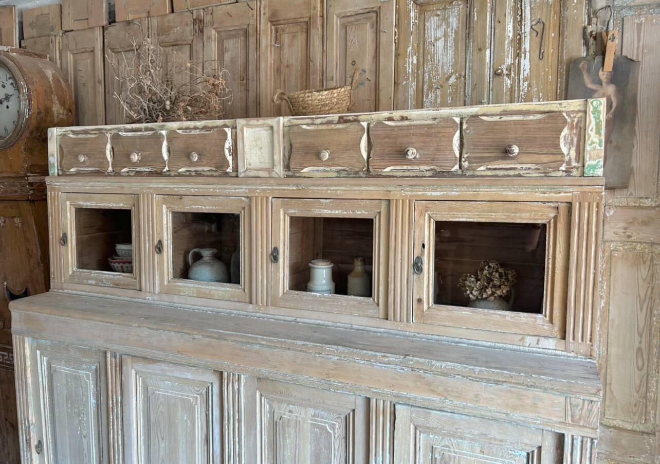 Old wooden grocery store cabinet, display cases and drawers
