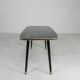 Vintage coffee table with glass top and angled legs