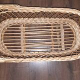 Vintage wicker cradle with wheels