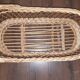 Vintage wicker cradle with wheels