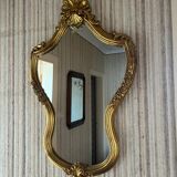 Miroir rocaille doré à la feuille