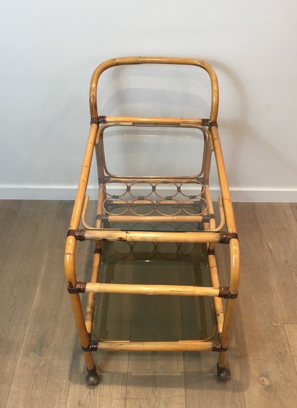 Rattan rolling table and leather ties