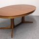 Oval extendable dining table by Baumann, France circa 1970.
