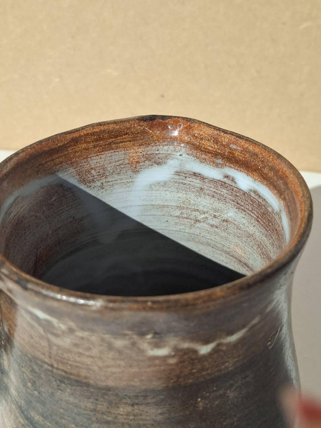 Stoneware pitcher signed by Jacques Pouchain.