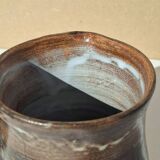 Stoneware pitcher signed by Jacques Pouchain.