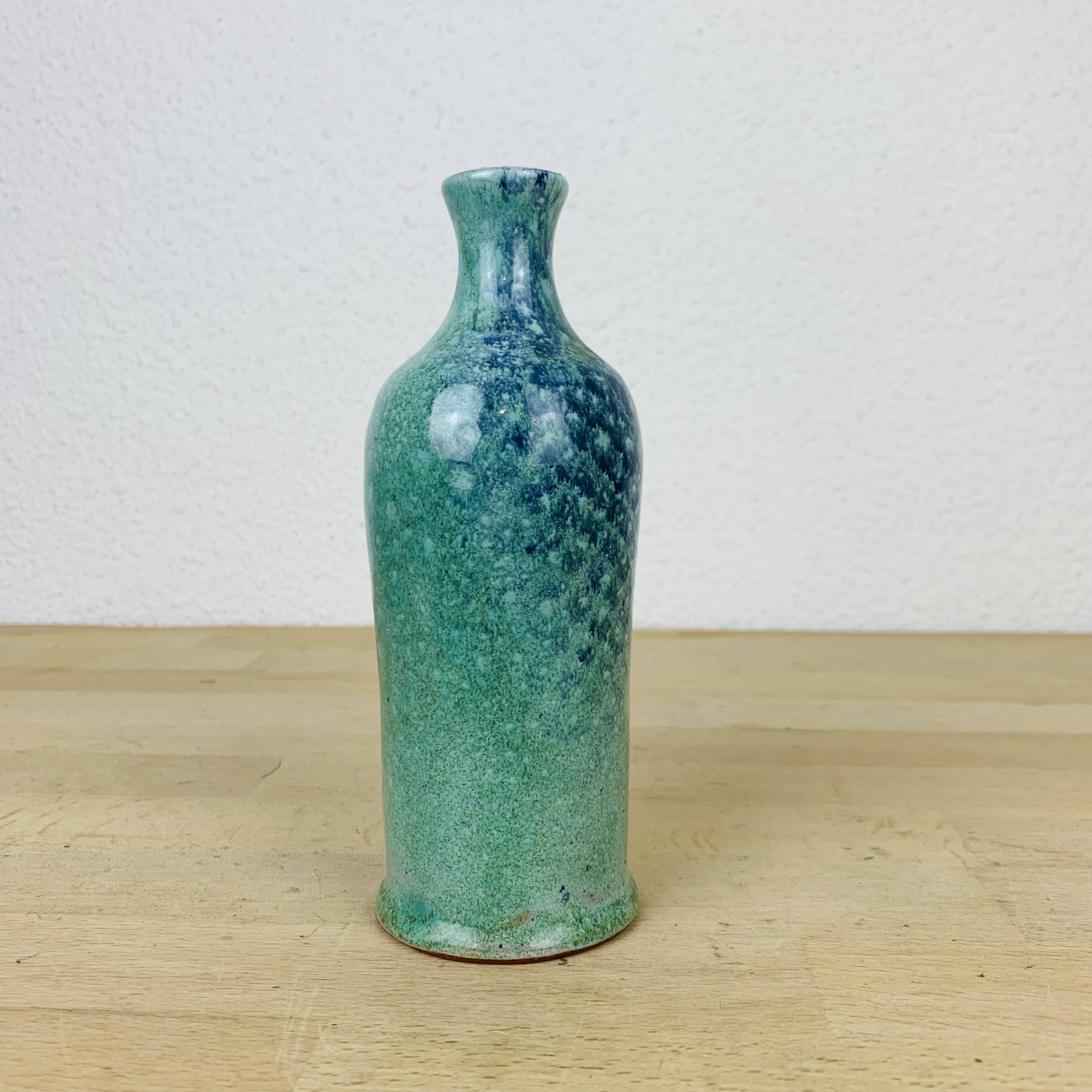 Blue ceramic bottle vase