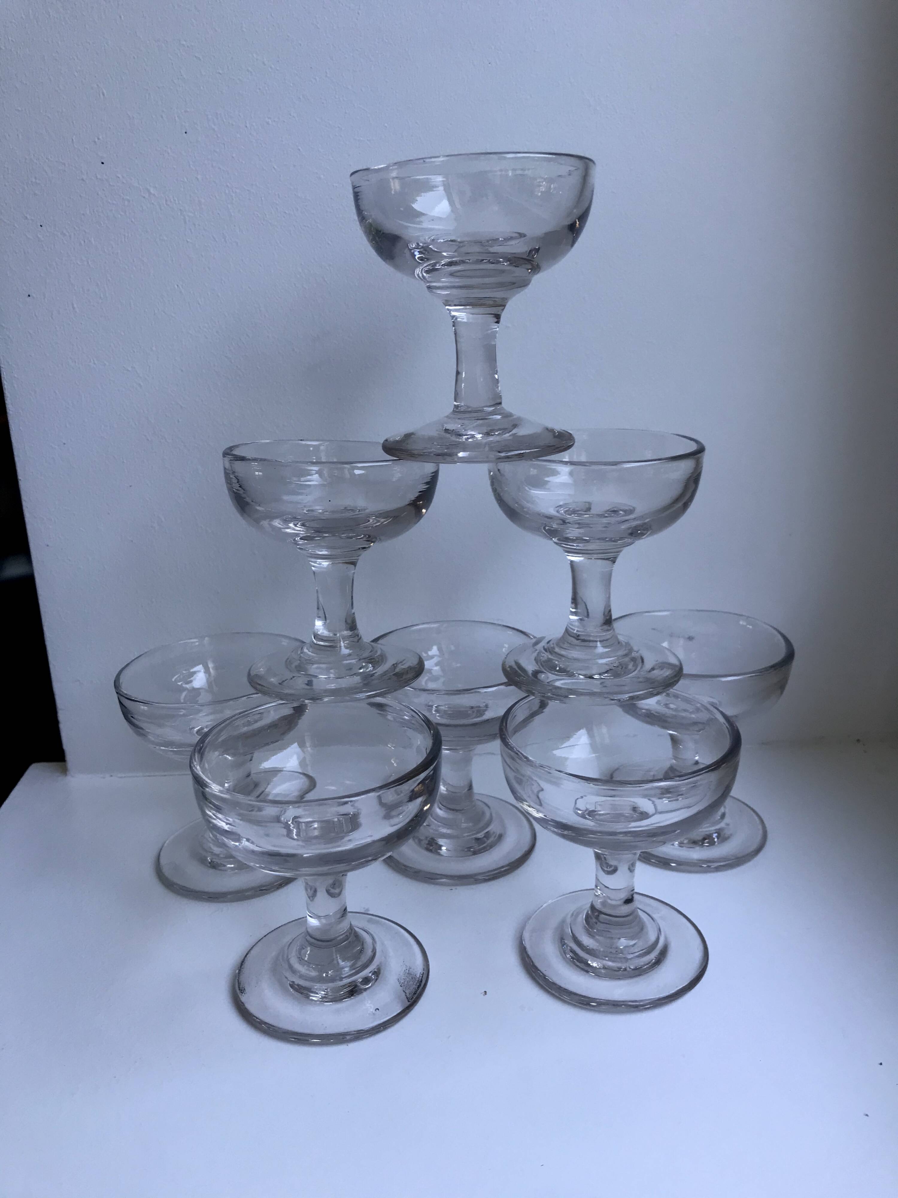 set of 9 small molded glass shot glasses early twentieth century