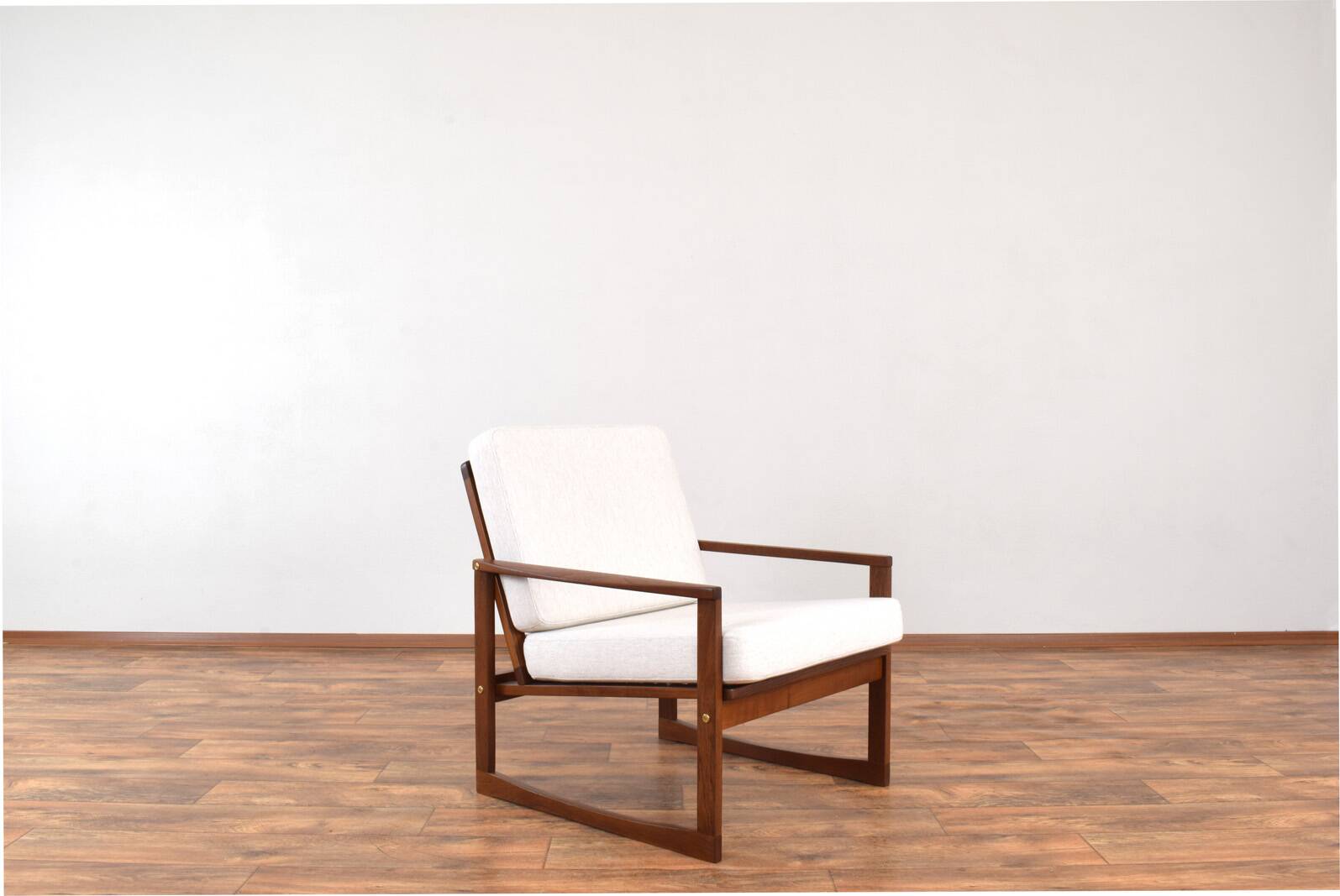 Fauteuil en teck danois des années 1960.